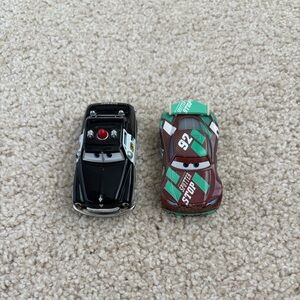 Pair of Disney Pixar Cars die-cast collectible cars Sheriff & Sheldon Shifter